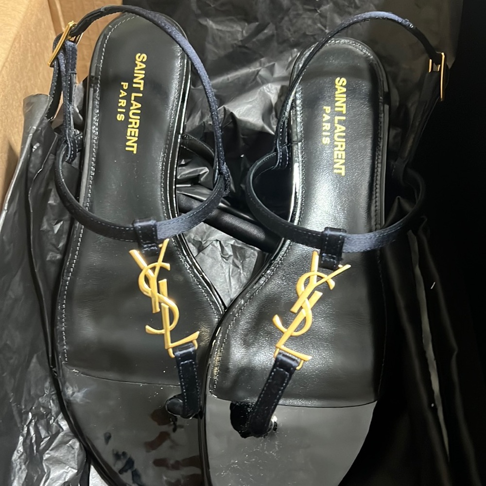 Brand new YSL cassandra flat sandals